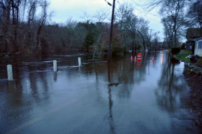 River Road Flood
A rainstorm on March 29 and 30 wreaked havoc on Massachusetts, leaving the Commonwealth in a state of emergency. The real fall-out didnt arrive until March 31, when water tables reached record heights and dams in the region were tested to their maximum capacity. The Hathaway Pond Dam in Rochester needed reinforcement with sandbags and the area of Plumb Corner and Dexter Lane became a makeshift pond. The Mattapoisett River overflowed its banks, shutting down River Road for a day. Photos by Tim Smith.
