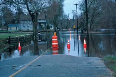 River Road Flood
A rainstorm on March 29 and 30 wreaked havoc on Massachusetts, leaving the Commonwealth in a state of emergency. The real fall-out didnt arrive until March 31, when water tables reached record heights and dams in the region were tested to their maximum capacity. The Hathaway Pond Dam in Rochester needed reinforcement with sandbags and the area of Plumb Corner and Dexter Lane became a makeshift pond. The Mattapoisett River overflowed its banks, shutting down River Road for a day. Photos by Tim Smith.
