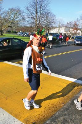 Turkey Trot
The first annual Marion Recreation Turkey Trot was held on Sunday, November 20, 2011. The winners were: Women's Division, Debe Griesbauer, 41, from Boston, with a running time of 19:19; and Men's Division, Taylor Washburn, 26, of Marion MA, with a running time of 16:42. Photo by Robert Chiarito.
