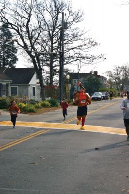 Turkey Trot
The first annual Marion Recreation Turkey Trot was held on Sunday, November 20, 2011. The winners were: Women's Division, Debe Griesbauer, 41, from Boston, with a running time of 19:19; and Men's Division, Taylor Washburn, 26, of Marion MA, with a running time of 16:42. Photo by Robert Chiarito.
