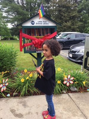 Tri-Town Against Racism
The Town of Rochester received a Little Diverse Free Library on June 17 when members of Tri-Town Against Racism performed a ribbon-cutting and associated Juneteenth celebration at Plumb Library. The ribbon was cut by Owen Excellent, and guest speaker Leon Correy spoke to overcoming struggles and the need for equity for all people. Entertainment was provided by Grace Morrison, and Trevor Brown Jr. spoke on the design of the Juneteenth Flag. Photos by Marilou Newell
