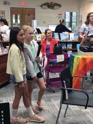 Elizabeth Tabor Library
Elizabeth Tabor Library staff and patrons enjoyed an evening of karaoke, snacks and joy as they celebrated Pride Month on June 22. Photos by Marilou Newell
