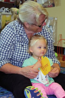 Taber Fall Lapsit Program
The Fall Lapsit Program for babies kicked off on October 7 at the Taber Library in Marion. Babies and their caregivers enjoy 20 minutes of stories and 20 minutes of social time. Children’s Librarian Rosemary Gray delighted five happy babies with some peekaboo, short stories such as Where is Baby’ Belly Button, and songs like the Itsy Bitsy Spider. The program starts at 10:30 am Tuesdays until November 25. Photos by Jean Perry
