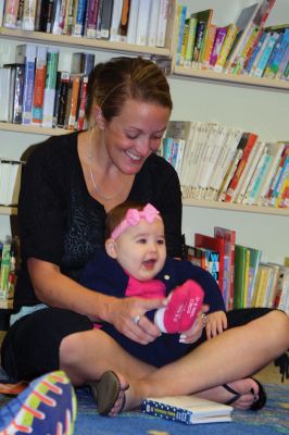 Taber Fall Lapsit Program
The Fall Lapsit Program for babies kicked off on October 7 at the Taber Library in Marion. Babies and their caregivers enjoy 20 minutes of stories and 20 minutes of social time. Children’s Librarian Rosemary Gray delighted five happy babies with some peekaboo, short stories such as Where is Baby’ Belly Button, and songs like the Itsy Bitsy Spider. The program starts at 10:30 am Tuesdays until November 25. Photos by Jean Perry
