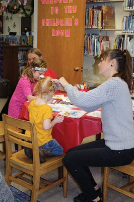 New Year’s Eve
The Taber Library knows that it’s hard for the little ones to stay up until midnight on New Year’s Eve, which is why Children’s Librarian Rosemary Grey hosted a midday mock-midnight New year’s Eve-Day party, complete with party tiaras, horns, snacks, and don’t forget the bubbly apple juice! Photos by Jean Perry
