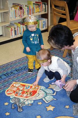 New Year’s Eve
The Taber Library knows that it’s hard for the little ones to stay up until midnight on New Year’s Eve, which is why Children’s Librarian Rosemary Grey hosted a midday mock-midnight New year’s Eve-Day party, complete with party tiaras, horns, snacks, and don’t forget the bubbly apple juice! Photos by Jean Perry
