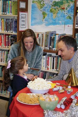 New Year’s Eve
The Taber Library knows that it’s hard for the little ones to stay up until midnight on New Year’s Eve, which is why Children’s Librarian Rosemary Grey hosted a midday mock-midnight New year’s Eve-Day party, complete with party tiaras, horns, snacks, and don’t forget the bubbly apple juice! Photos by Jean Perry
