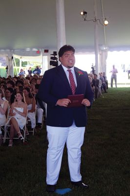 Tabor Academy
Olympic gold medalist Colleen Coyne of the Class of 1989 gave the Commencement Address, as Tabor Academy held its graduation exercises on May 31 under a large, white tent open to the sea air coming off Sippican Harbor. Coyne, a member of the 1998 Team USA ice hockey team, spoke of her experience learning to balance personal success against society’s measure of success. Photos by Mick Colageo
