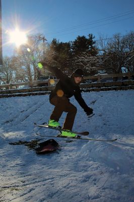 Ski Jumps
Tabor Academy sophomores Andrei Sarbu (yellow pants) and Joe Barry and friends enjoyed their Sunday afternoon, turning the little sledding slope on Spring Street at Tabor Academy’s soccer field into a ski jump. The two 16-year-olds took turns sticking landings from atop roadway barriers. Barry is from Falls Church, Virginia, and Sarbu is a native of Chico, California. Photos by Mick Colageo
