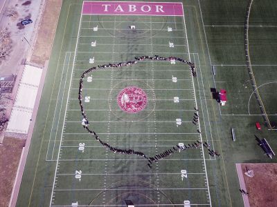 Tabor Walkout
Tabor students organized a walk out on Friday, April 20, in solidarity with students across the country recognizing the 19th anniversary of the Columbine High School massacre. Students placed 18 empty chairs in the Stroud Academic Center Courtyard to symbolize the 17 lives lost in the Parkland shooting, plus one to symbolize the many others affected by these events. Students then led a silent walk around the turf field for 17 minutes, one minute for each of the 17 victims in Florida. Photos courtesy Tabor A
