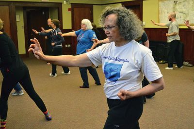 World Tai Chi and Qigong Day
A group in Mattapoisett joined others across the globe in celebrating World Tai Chi and Qigong Day on April 26 at 10:00 am, just as other groups did at 10:00 am in their local time zones. Led by Tai Chi Practitioner Colman Fink, 15 locals moved gracefully together with conscious breath in the downstairs of the Mattapoisett Free Library – thanks to the rain that dampened the plan to meet at Ned’s Point for a second year in a row. By Jean Perry
