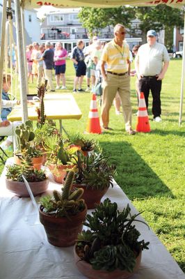 Taste of Mattapoisett
The Taste of Mattapoisett event was held by the Mattapoisett Woman’s Club on Tuesday under the Lions Club’s tent at Shipyard Park, where attendees enjoyed delectable creations from 12 local restaurants and were entertained by the Showstoppers. Photos by Mick Colageo
