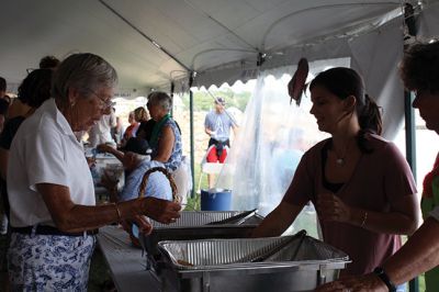 Local Flavor 
Tuesday evening was the Mattapoisett Women’s Club sponsored Taste of the Town, an annual event when local food purveyors fill the tent at Shipyard Park with the flavors and aromas of Mattapoisett’s lively restaurant scene. Photos by Jean Perry
