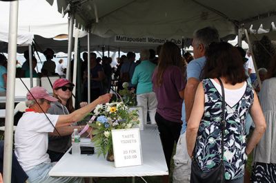 Local Flavor 
Tuesday evening was the Mattapoisett Women’s Club sponsored Taste of the Town, an annual event when local food purveyors fill the tent at Shipyard Park with the flavors and aromas of Mattapoisett’s lively restaurant scene. Photos by Jean Perry
