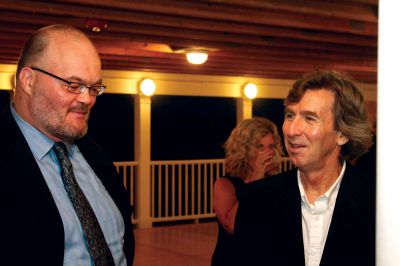 Taste of the Tri-Town
Lighthouse Fund Chairman Kim Frink (left) and ORR Tri-Town Education Foundation member Peter Martin socialize during the group's fourth annual Taste of the Tri-Town on Friday, September 7, 2012.  The event, which was held at the Mattapoisett YMCA, helps serve the Lighthouse Fund, which offers grants to local teachers for special educational projects.  Photo by Eric Tripoli.
