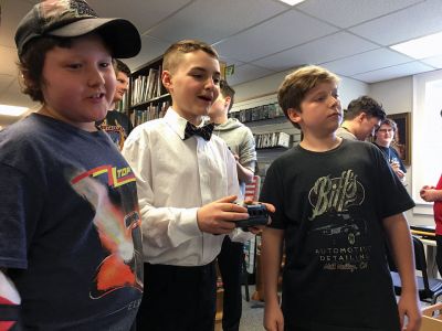 Robots
Old Colony student Bridgett Farias of Rochester demonstrates how a robot works during an introductory meeting sponsored by Plumb Library on May 17. Students in Grades 4 through 6 got to drive robots and learn more about the high school program. Photo by Marilou Newell
