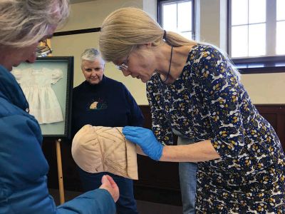 Textile Conservation
Kathryn Tarleton gave a presentation on the art and science of textile conservation on March 18 at the Mattapoisett Free Public Library. She also examined historic articles for several area residents. Photos by Marilou Newell
