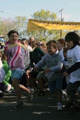 Mom's Running
Over 600 runners came to Mattapoisett on May 9, 2010 to celebrate mom in the fourth annual Tiara Classic 5K road race. This years race had more runners than ever, despite the wind and cold temperatures. The road race benefits the New Bedford Womens Fund, an organization that empowers and provides upward mobility to women. Photos by Anne OBrien-Kakley.
