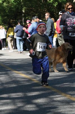 Mom's Running
Over 600 runners came to Mattapoisett on May 9, 2010 to celebrate mom in the fourth annual Tiara Classic 5K road race. This years race had more runners than ever, despite the wind and cold temperatures. The road race benefits the New Bedford Womens Fund, an organization that empowers and provides upward mobility to women. Photos by Anne OBrien-Kakley.
