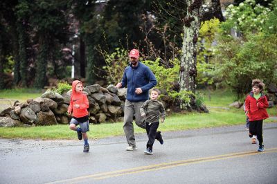 Tiara 5K Road Race
The Tiara 5K road race sponsored by Oxford Creamery has become a staple Mother’s Day tradition in Mattapoisett. The weather was damp and chilly, but still 441 runners turned out for the Mattapoisett village run to benefit the Women’s Fund of New Bedford. Photos by Colin Veitch
