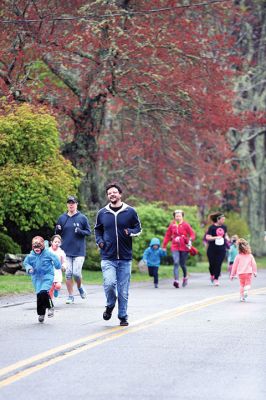 Tiara 5K Road Race
The Tiara 5K road race sponsored by Oxford Creamery has become a staple Mother’s Day tradition in Mattapoisett. The weather was damp and chilly, but still 441 runners turned out for the Mattapoisett village run to benefit the Women’s Fund of New Bedford. Photos by Colin Veitch
