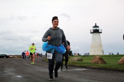 Mother’s Day Tiara 5k
Sunday’s wind and rain wasn’t stopping the hundreds who participated in the annual Mother’s Day Tiara 5k in Mattapoisett on May 10.  The storm brought strong wind and cold rain to the area, especially at the turn around Ned’s Point Lighthouse, dampening the day but not the sentiment behind the Women’s Fund of Southeastern Massachusetts’ largest annual fundraising event. Photos by Jean Perry
