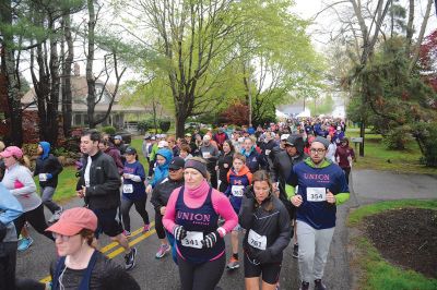 Tiara 5K Road Race
The Tiara 5K road race sponsored by Oxford Creamery has become a staple Mother’s Day tradition in Mattapoisett. The weather was damp and chilly, but still 441 runners turned out for the Mattapoisett village run to benefit the Women’s Fund of New Bedford. Photos by Colin Veitch
