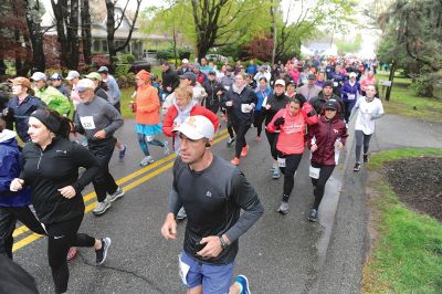 Tiara 5K Road Race
The Tiara 5K road race sponsored by Oxford Creamery has become a staple Mother’s Day tradition in Mattapoisett. The weather was damp and chilly, but still 441 runners turned out for the Mattapoisett village run to benefit the Women’s Fund of New Bedford. Photos by Colin Veitch
