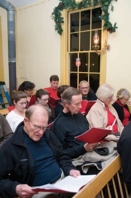 Tinkhamtown Chapel
The pews were filled at Tinkhamtown Chapel during its annual caroling event on December 18, 2010. The carolers sang traditional holiday favorites by the light of eight kerosene lights. Photos by Felix Perez.
