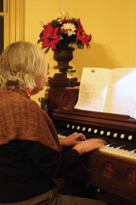 Tinkhamtown Chapel Christmas Carol Sing
The organ was back in business this year for the annual Tinkhamtown Chapel Christmas Carol Sing on Saturday, December 17. The kerosene lamps were lit, the children partook in the traditional “The Twelve Days if Christmas,” and all was merry and bright as Christmas in Mattapoisett should be. Photos by Jean Perry
