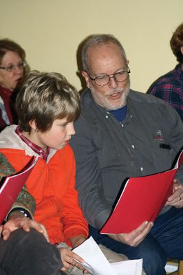 Tinkhamtown Chapel Christmas Carol Sing
The organ was back in business this year for the annual Tinkhamtown Chapel Christmas Carol Sing on Saturday, December 17. The kerosene lamps were lit, the children partook in the traditional “The Twelve Days if Christmas,” and all was merry and bright as Christmas in Mattapoisett should be. Photos by Jean Perry
