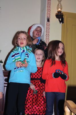 Tinkhamtown Chapel Christmas Carol Sing
The organ was back in business this year for the annual Tinkhamtown Chapel Christmas Carol Sing on Saturday, December 17. The kerosene lamps were lit, the children partook in the traditional “The Twelve Days if Christmas,” and all was merry and bright as Christmas in Mattapoisett should be. Photos by Jean Perry
