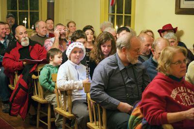 Tinkhamtown Chapel
The annual Christmas carol sing-along at the Tinkhamtown Chapel was as popular and beautiful as ever on the chilly evening of December 20, when dozens of people followed the glow of candlelit windows to the tiny chapel to sing with their families and neighbors and welcome Christmas to Mattapoisett. Photos by Colin Veitch
