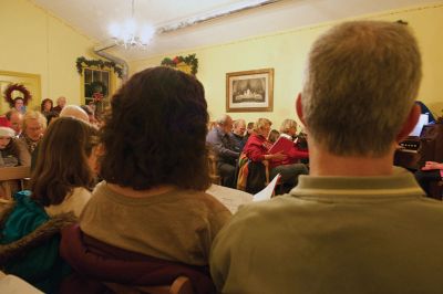 Tinkhamtown Chapel
The annual Christmas carol sing-along at the Tinkhamtown Chapel was as popular and beautiful as ever on the chilly evening of December 20, when dozens of people followed the glow of candlelit windows to the tiny chapel to sing with their families and neighbors and welcome Christmas to Mattapoisett. Photos by Colin Veitch
