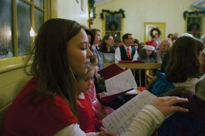 Tinkhamtown Chapel
The annual Christmas carol sing-along at the Tinkhamtown Chapel was as popular and beautiful as ever on the chilly evening of December 20, when dozens of people followed the glow of candlelit windows to the tiny chapel to sing with their families and neighbors and welcome Christmas to Mattapoisett. Photos by Colin Veitch
