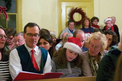 Tinkhamtown Chapel
The annual Christmas carol sing-along at the Tinkhamtown Chapel was as popular and beautiful as ever on the chilly evening of December 20, when dozens of people followed the glow of candlelit windows to the tiny chapel to sing with their families and neighbors and welcome Christmas to Mattapoisett. Photos by Colin Veitch
