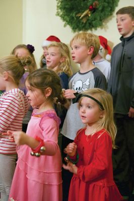Tinkhamtown Chapel
The annual Christmas carol sing-along at the Tinkhamtown Chapel was as popular and beautiful as ever on the chilly evening of December 20, when dozens of people followed the glow of candlelit windows to the tiny chapel to sing with their families and neighbors and welcome Christmas to Mattapoisett. Photos by Colin Veitch
