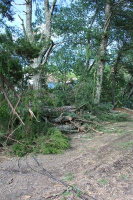 Tornado in Mattapoisett
An EF-1 tornado touched down late Tuesday morning in Mattapoisett. The unusual weather event downed power lines and hundreds of trees, knocking out power to many homes north of Route 195. Television news crews descended from Boston, as the Mattapoisett Fire and Police departments worked with utility companies and many power lines to clean up roads and assist area residents coming home to frightening scenes. Photo by Mick Colageo
