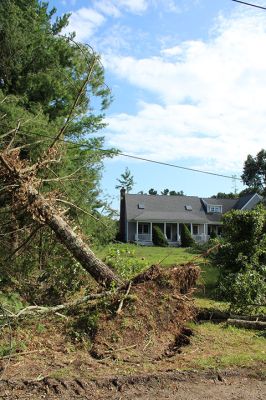 Tornado in Mattapoisett
An EF-1 tornado touched down late Tuesday morning in Mattapoisett. The unusual weather event downed power lines and hundreds of trees, knocking out power to many homes north of Route 195. Television news crews descended from Boston, as the Mattapoisett Fire and Police departments worked with utility companies and many power lines to clean up roads and assist area residents coming home to frightening scenes. Photo by Mick Colageo
