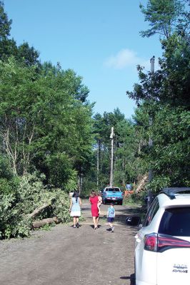 Tornado in Mattapoisett
An EF-1 tornado touched down late Tuesday morning in Mattapoisett. The unusual weather event downed power lines and hundreds of trees, knocking out power to many homes north of Route 195. Television news crews descended from Boston, as the Mattapoisett Fire and Police departments worked with utility companies and many power lines to clean up roads and assist area residents coming home to frightening scenes. Photo by Mick Colageo
