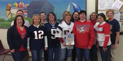 Patriots Support 
The folks at the Marion Town Hall had a pizza party on Friday and dressed to show their support for the Patriots in the big game. Photo courtesy of Michele Bissonnette
