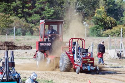 Mass Mini Tractor Pullers 
The Rochester Country Fairgrounds hosted a tractor pull of the Mass Mini Tractor Pullers Association on October 10. The tractors are hand-built by their owners, using naturally-aspirated auto engines that are 500-1,000 horsepower. There will be another all-day tractor pull event on October 24 from 9:00 am to 5:00 pm. Photos by Colin Veitch
