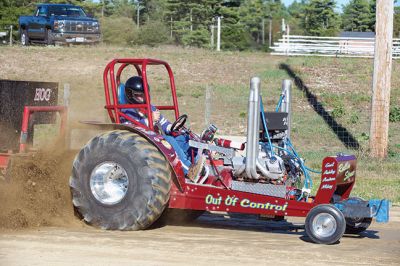 Mass Mini Tractor Pullers 
The Rochester Country Fairgrounds hosted a tractor pull of the Mass Mini Tractor Pullers Association on October 10. The tractors are hand-built by their owners, using naturally-aspirated auto engines that are 500-1,000 horsepower. There will be another all-day tractor pull event on October 24 from 9:00 am to 5:00 pm. Photos by Colin Veitch
