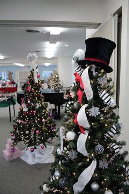Festival of Trees 
The Festival of Trees opened on November 27 with a reception at the Cushing Community Center on Route 6 in Marion. Sponsored by the Friends of Marion Council on Aging, the event showcased 14 decorated Christmas trees, along with an artisan sale, music, refreshments and a raffle for over 10 gift baskets. For more information about the Festival of Trees, call Karen Gregory at 508-748-3570. Photos by Mick Colageo and Marilou Newell
