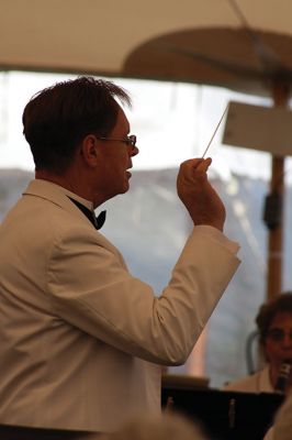 Tri-County Symphonic Band
The Tri-County Symphonic Band, under the direction of Philip Sanborn, hosted its 14th Annual Benefit Pops Concert beneath a breezy tent on the grounds of Tabor Academy on Sunday, June 12. This year’s concert had the appropriate theme “Celebration of the Sea,” and event-goers delighted in ocean-themed songs (and cupcakes) with Sippican Harbor as the backdrop. Photos by Jean Perry
