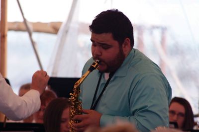 Tri-County Symphonic Band
The Tri-County Symphonic Band, under the direction of Philip Sanborn, hosted its 14th Annual Benefit Pops Concert beneath a breezy tent on the grounds of Tabor Academy on Sunday, June 12. This year’s concert had the appropriate theme “Celebration of the Sea,” and event-goers delighted in ocean-themed songs (and cupcakes) with Sippican Harbor as the backdrop. Photos by Jean Perry
