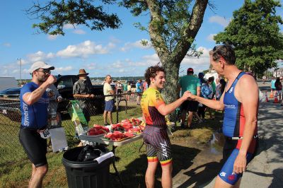 Mattapoisett Lions Club’s annual Sprint Triathlon 
Multiple generations greeted a pleasant Sunday morning and competed in the Mattapoisett Lions Club’s annual Sprint Triathlon that began at the Town Beach and ended nearby on Water Street. Photos by Mick Colageo
