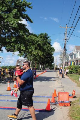 Mattapoisett Lions Club’s annual Sprint Triathlon 
Multiple generations greeted a pleasant Sunday morning and competed in the Mattapoisett Lions Club’s annual Sprint Triathlon that began at the Town Beach and ended nearby on Water Street. Photos by Mick Colageo
