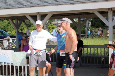 Mattapoisett Lions Club’s annual Sprint Triathlon 
Multiple generations greeted a pleasant Sunday morning and competed in the Mattapoisett Lions Club’s annual Sprint Triathlon that began at the Town Beach and ended nearby on Water Street. Photos by Mick Colageo
