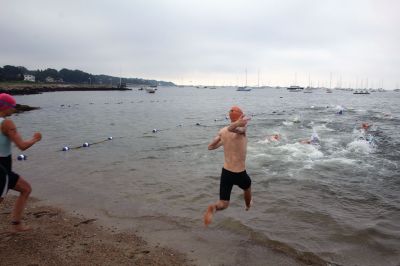 Mattapoisett Lions Club Triathlon
Emily Tato was grateful to Aner Larreategi after their top-three-overall performances in Sunday’s Mattapoisett Lions Club Triathlon. Pushed from start to finish by Larreategi, Tato was the fastest woman in all three events, the swim, bike and run. Don Cuddy was the 70-and-over winner. Photos by Mick Colageo
